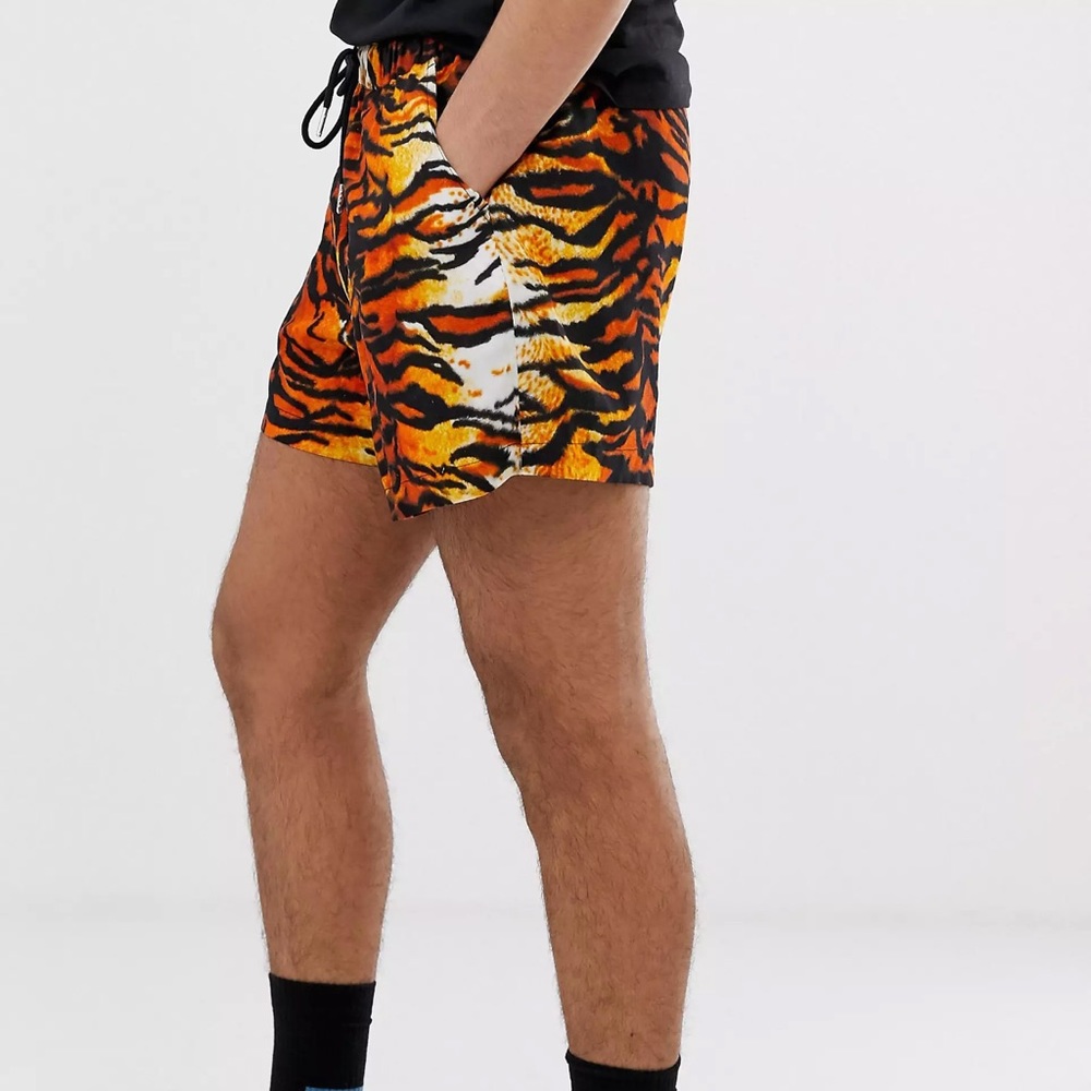 ASOS Design slim shorter shorts in tiger print